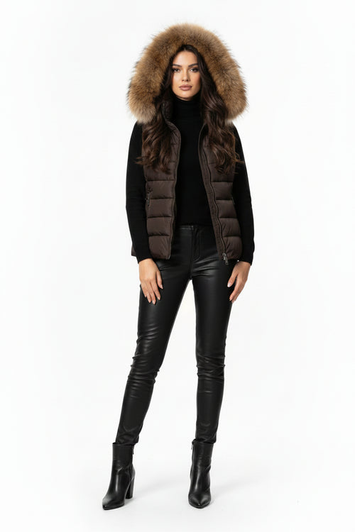 Ladies dark puffer waistcoat with faux-fur hood trim, zip front, side pockets