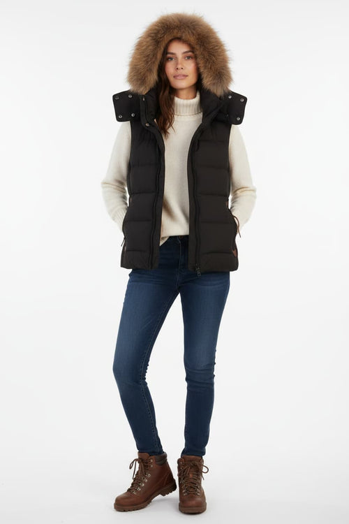 Women's black padded waistcoat with fur-trimmed hood and snap pockets