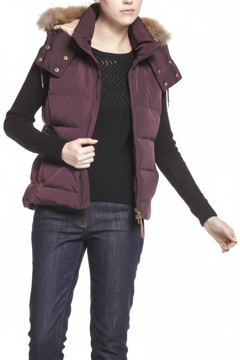 Women's maroon puffer gilet with fur-trim hood, gold-tone snap buttons, quilted front