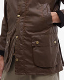 Barbour Ashby Wax Jacket - Bark wax jacket chest pocket with Barbour-branded button and zipper detail