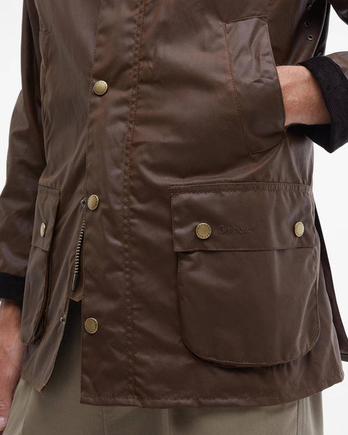 Barbour Ashby Wax Jacket - Bark wax jacket chest pocket with Barbour-branded button and zipper detail