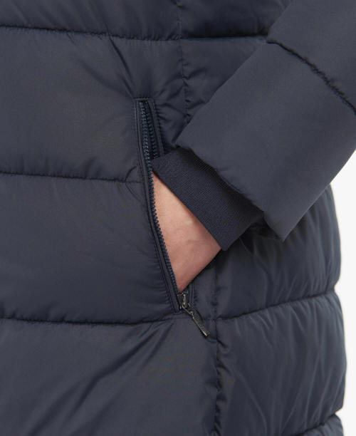 Dark navy quilted jacket front zipper with angled zip pull and padded panels