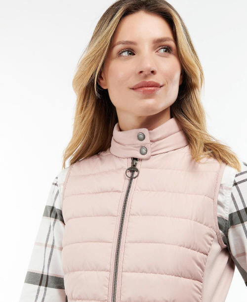 Pastel pink quilted gilet collar with snap button and metal zip pull