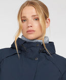 Navy waterproof jacket with hood, front snap placket, and stand collar