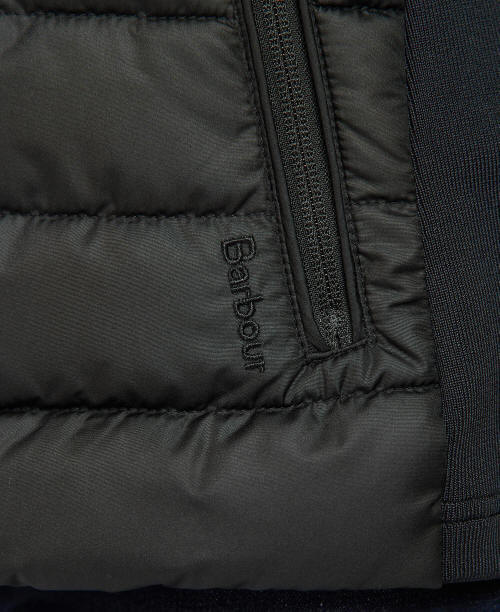 Black quilted jacket pocket with zip and Barbour embroidery detail