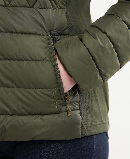 Olive quilted jacket sleeve cuff with zip pull