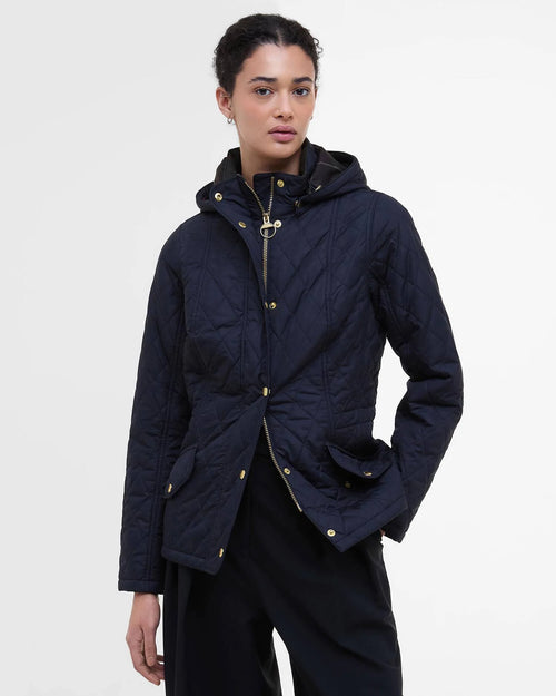 Women's navy quilted hooded jacket with front zip, gold button placket, drawcord hood