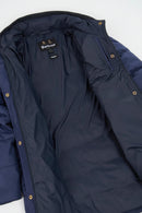 Quilted hooded jacket in dark navy with snap buttons and stitched panels