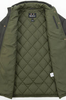 Quilted olive green jacket lining with diamond stitch and Barbour inner label.