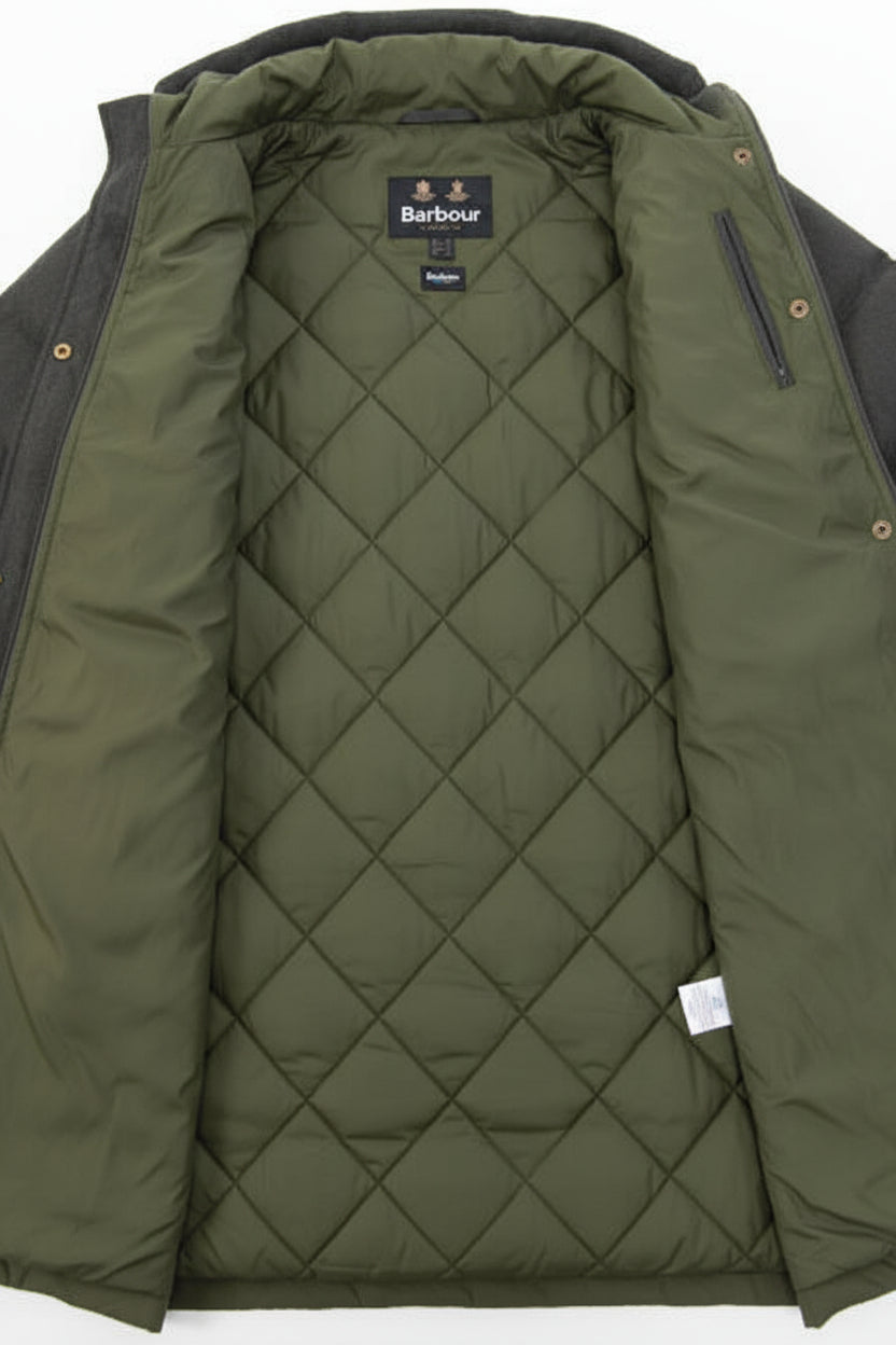 Quilted olive green jacket lining with diamond stitch and Barbour inner label.