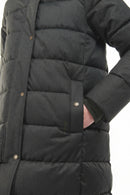 Dark quilted puffer jacket with snap front and side pocket detailing.