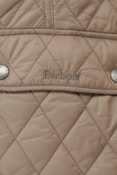 Quilted Barbour gilet in light tan with diamond stitching and front logo badge