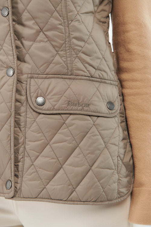 Barbour quilted vest gilet in light tan with snap pockets and logo patch