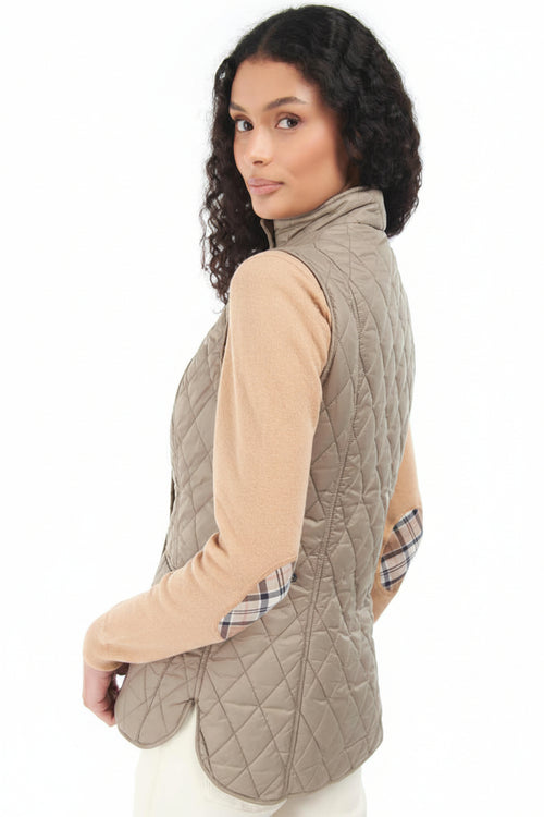 Quilted light tan vest gilet with stand collar and diagonal snap pockets