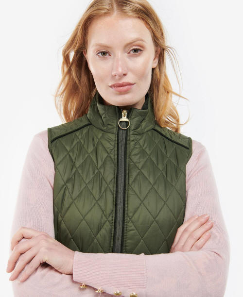 Olive quilted sleeveless gilet with center zip, stand collar, and snap flap pockets