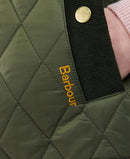 Close-up of olive quilted gilet with Barbour logo patch and black knit collar trim