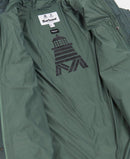 Dark green quilted coat with Barbour neck label and geometric lining print