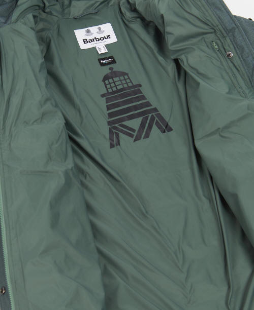 Dark green quilted coat with Barbour neck label and geometric lining print
