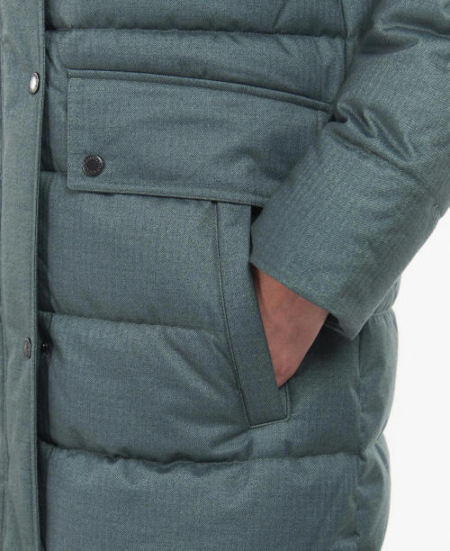 Dark green quilted coat with flap pockets and snap-button panel details