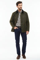 Olive Barbour jacket with button-front, stand collar, and two flap pockets