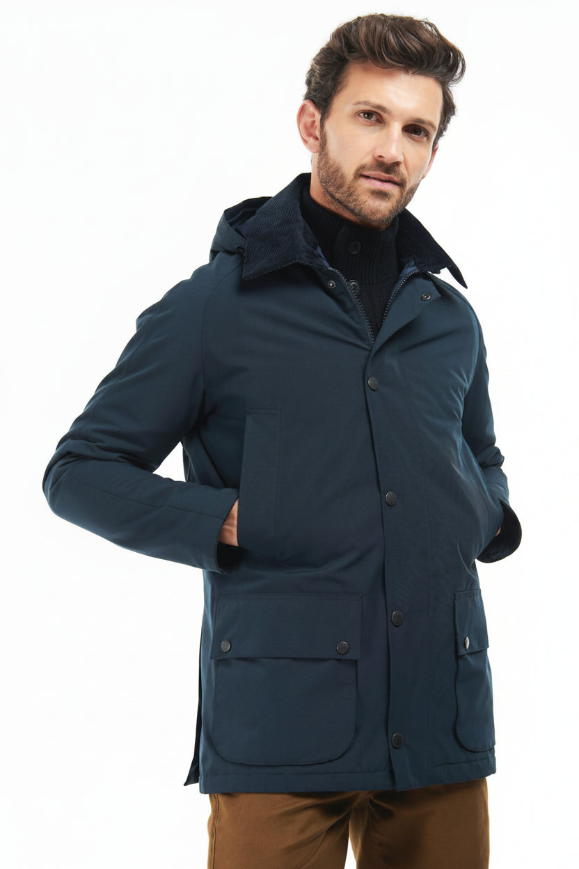 Barbour navy winter jacket with adjustable buttoned cuffs and multiple flap pockets