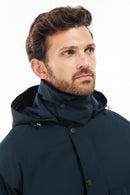 Barbour dark navy jacket with hood and snap-up collar