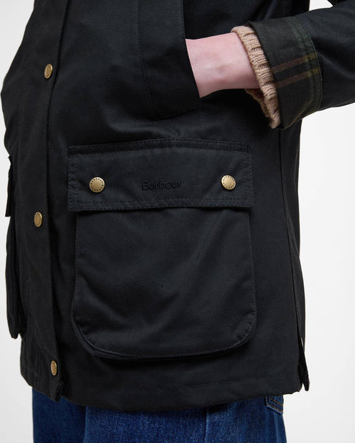 Black women’s wax jacket back/side with flap pocket and gold-tone buttons at cuff
